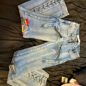 SOLD.    jeans with lots of cool details! it has some slight issues as shown